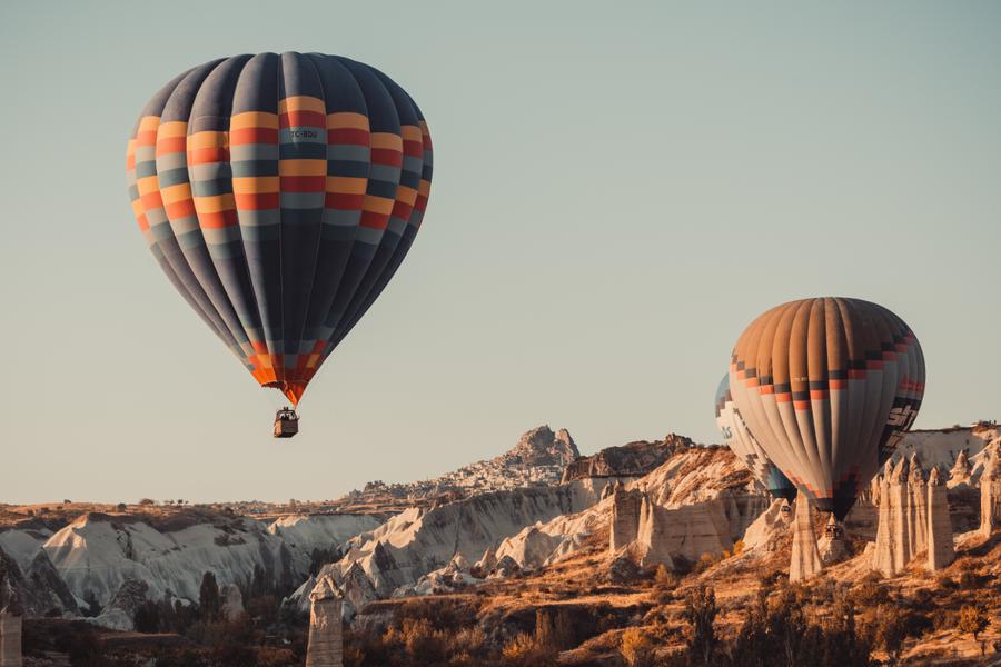 Hover over hoodoos in a hot air balloon, marvel at the Blue Mosque, and ponder the snow-white travertine pools of Pamukkale