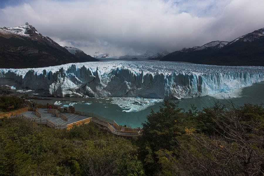 Join Travel blogger Michael Turtle in the shadow of Argentina’s Perito Moreno as huge icebergs on the glacier's face cave and collapse.