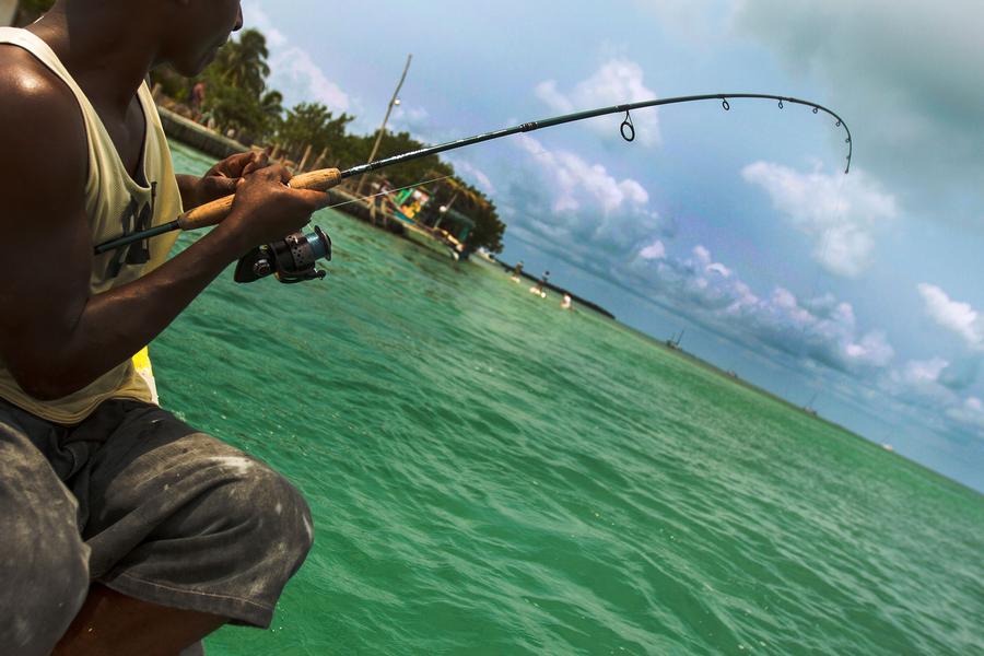 Hammocks, sunsets and sea shells: Wanderer-in-Residence Gary Arndt learns what it means to “go slow” on this Caribbean island.