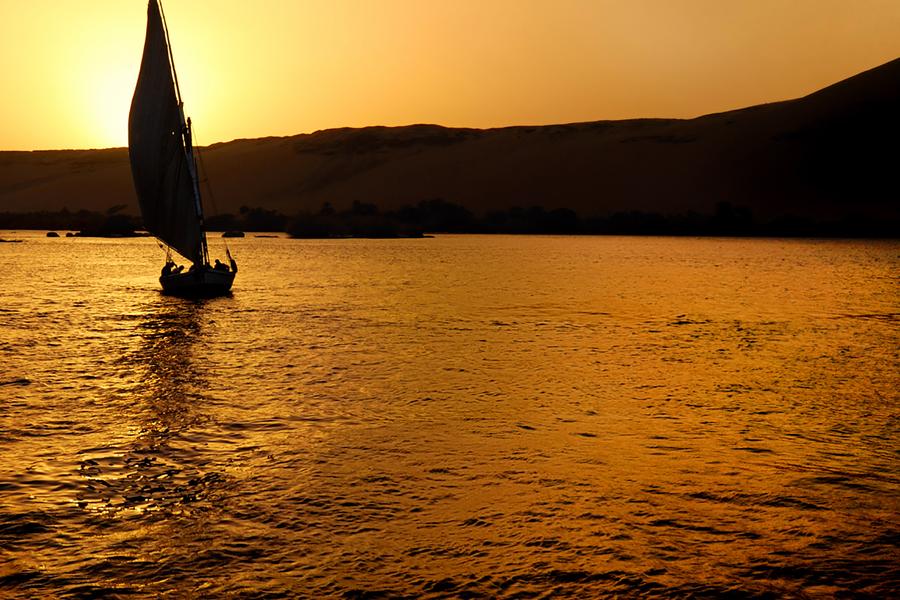 Travel the River Nile as people who have in the time of the Pharaohs on a felucca boat with travel writer Paul Manser.