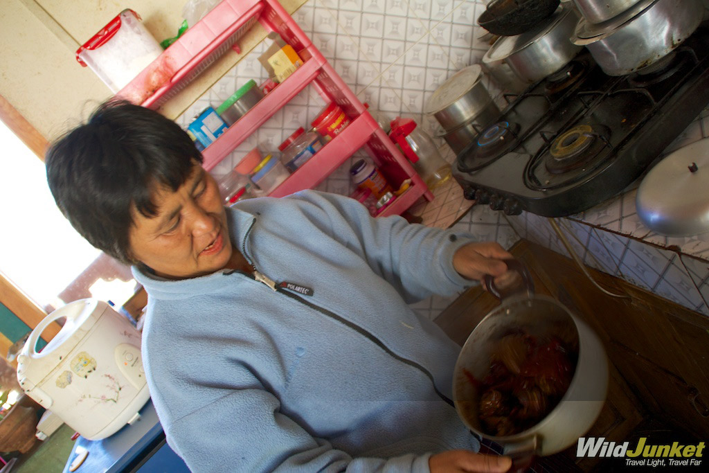 Ama Om showing me the ropes in her kitchen.