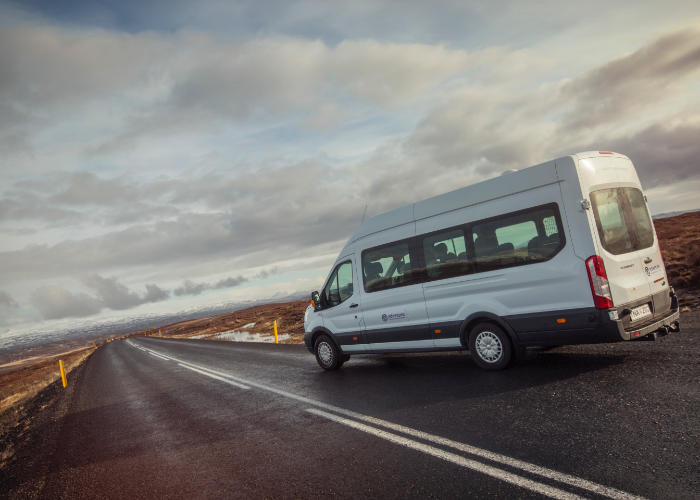 let us do the driving so you can watch Icelandic landscapes go by